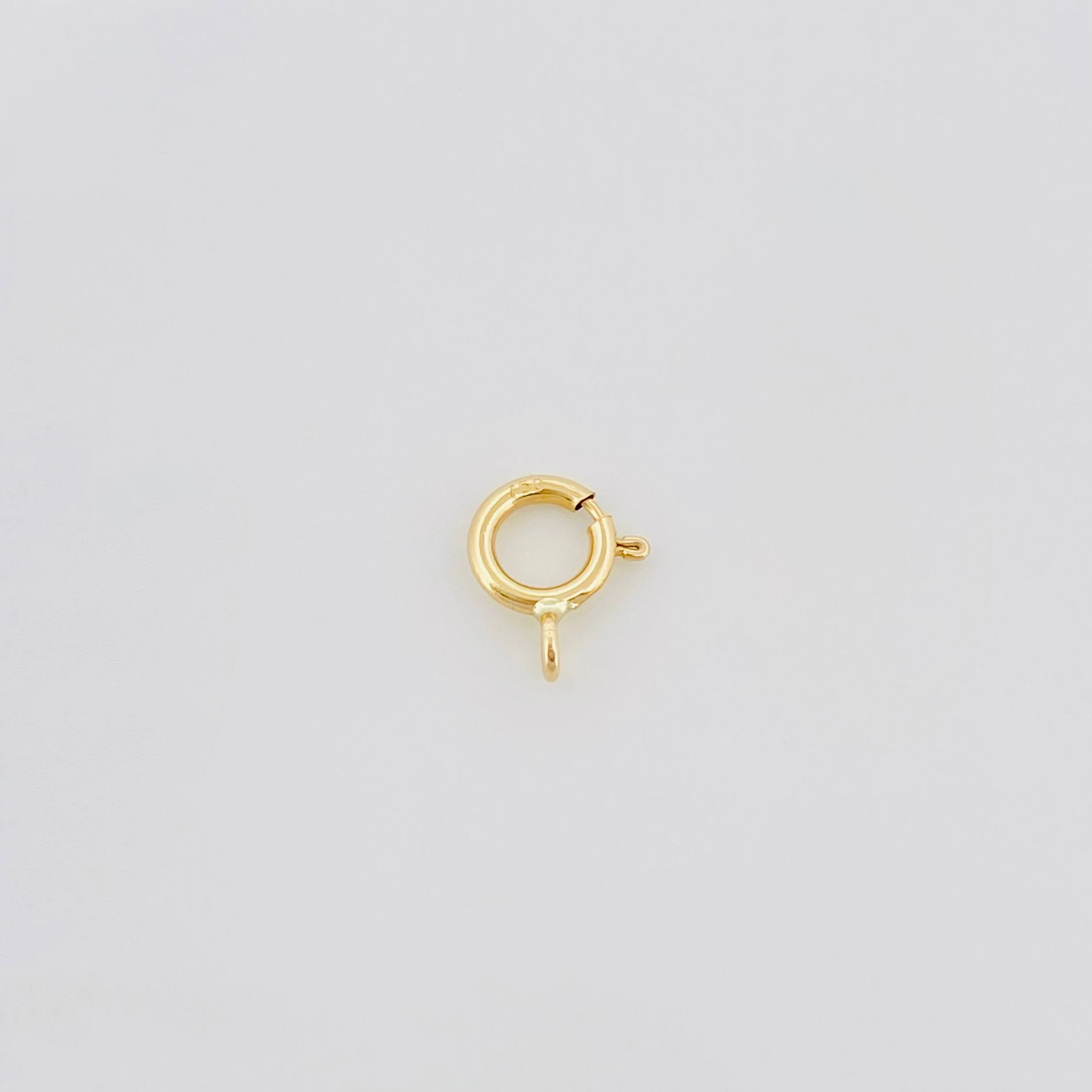 Broche Reasa 0.1 g Oro Amarillo 18K