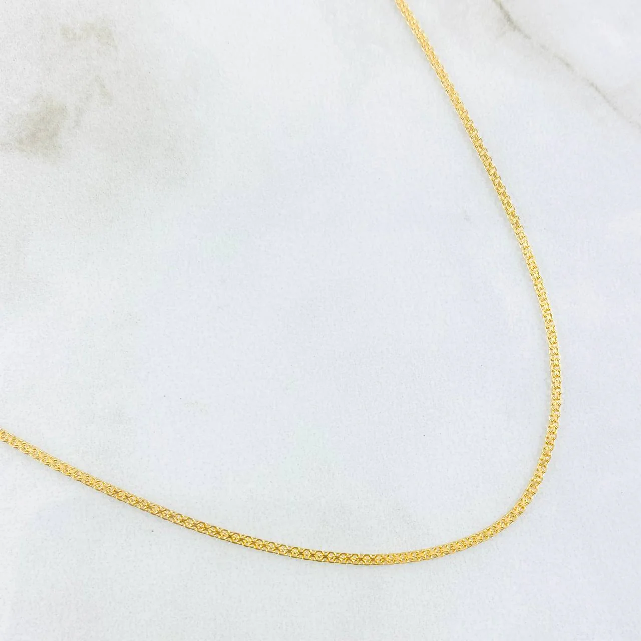Cadena China 2.3gr / 60cm / 1.3mm Oro Amarillo +1 18K ©