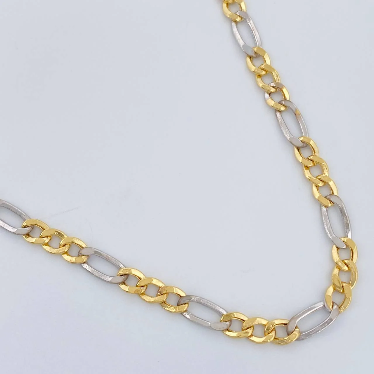 Cadena Figaro 6.25gr / 65cm / 3.1mm Dos Oros Amarillo Blanco +1 18K %
