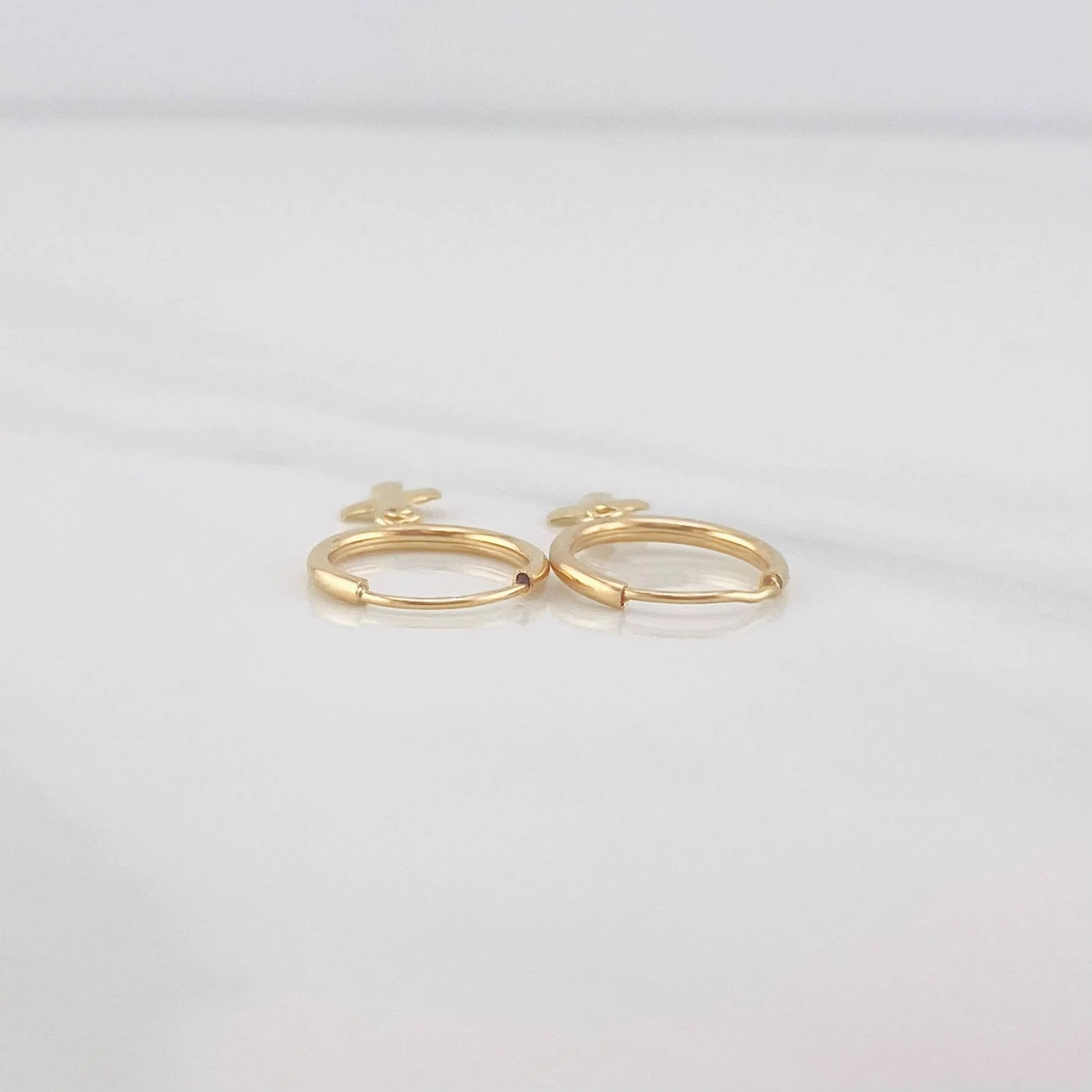 Candongas Cruz 0.6g / 2cm Oro Amarillo 18K - Image 3