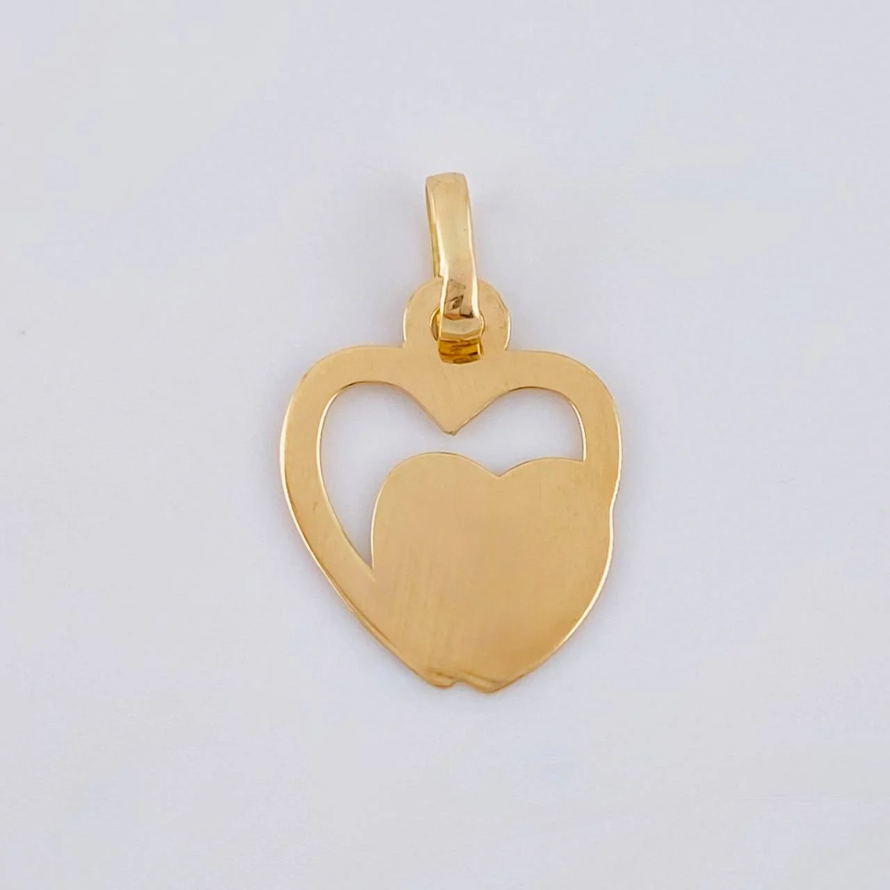 Dije Corazones Unidos 0.55 g / 1.8 cm Oro Amarillo 18K