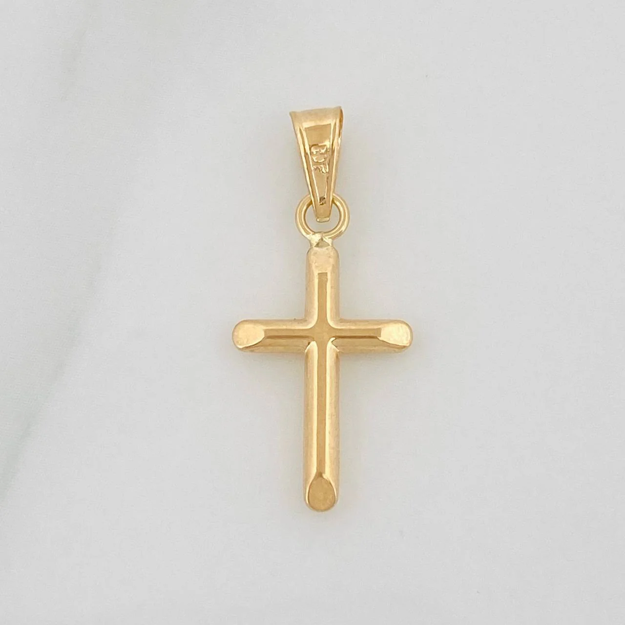 Dije Cruz 0.4gr / 2cm / Oro Amarillo 18K %