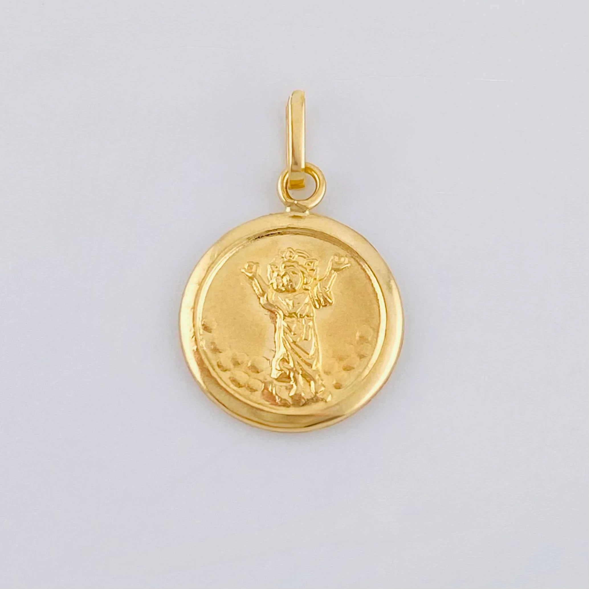 Dije Divino Niño 0.45gr / 1.9cm / Oro Amarillo 18K ©