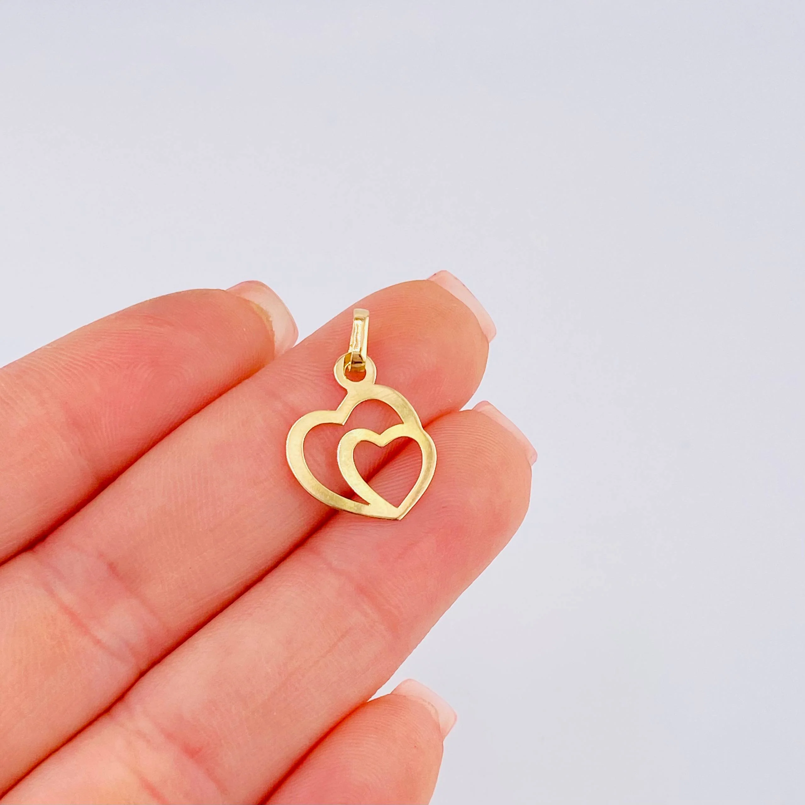 Dije Doble Corazón 0.45 g / 2 cm Oro Amarillo 18K - Image 4