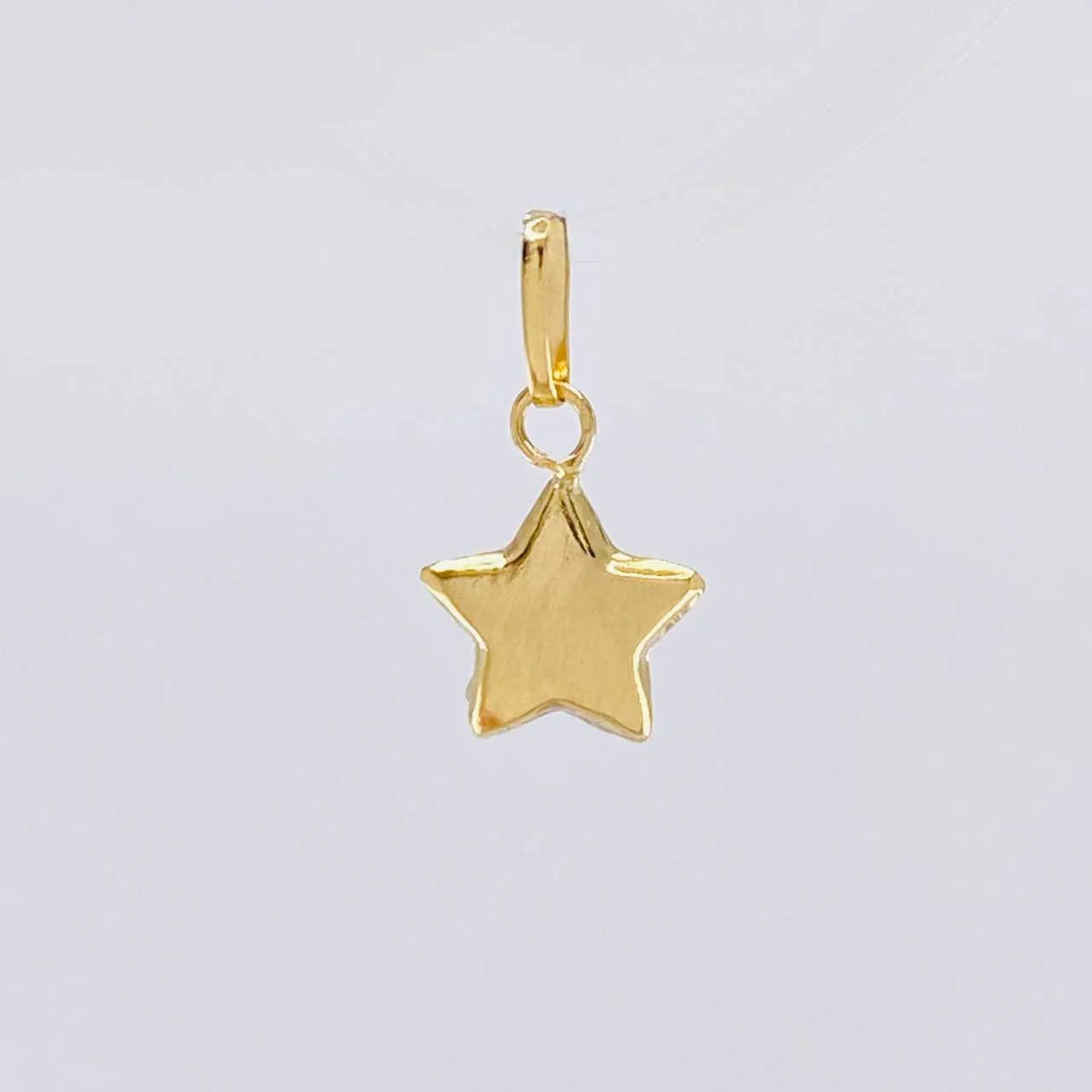 Dije Estrella 0.25g / 1.2cm Oro Amarillo 18K - Image 2