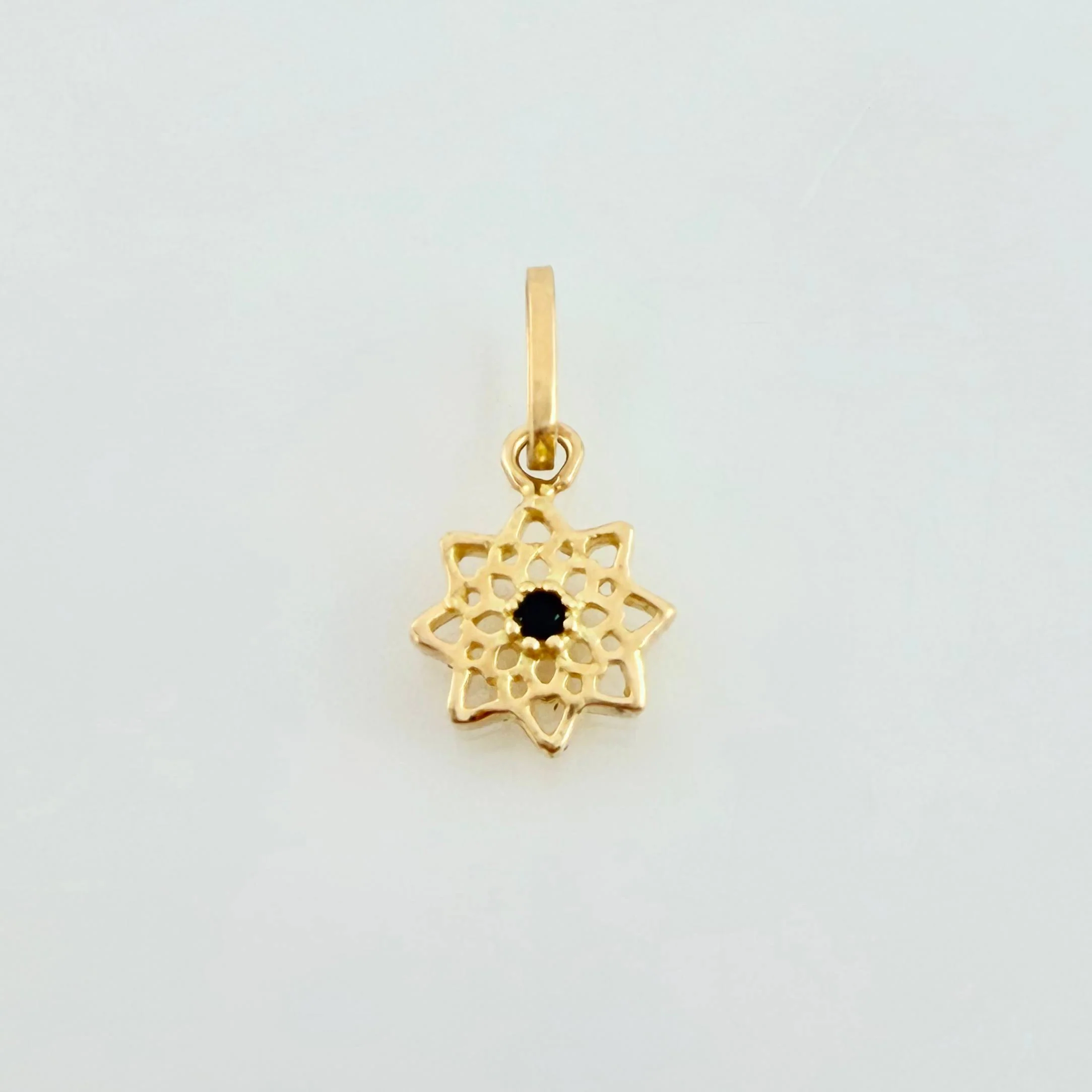 Dije Estrella 8 Puntas 0.45gr / 1.2cm / Oro Amarillo 18K