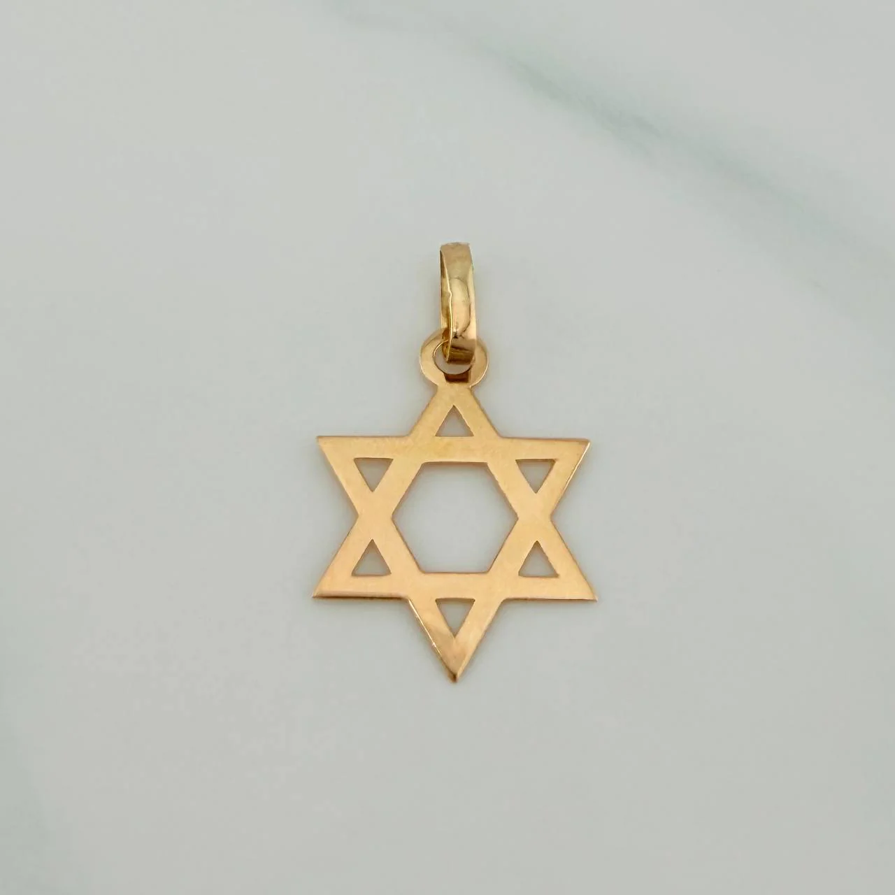 Dije Estrella de David 0.4gr / 2cm / Oro Amarillo 18K %