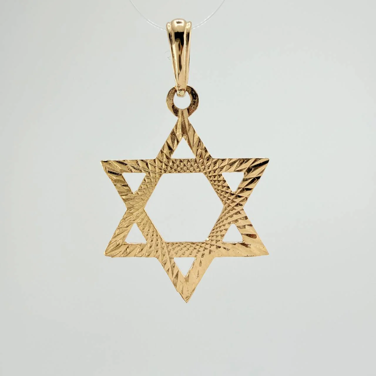 Dije Estrella De David 2.35gr / 4cm / Oro Amarillo 18K