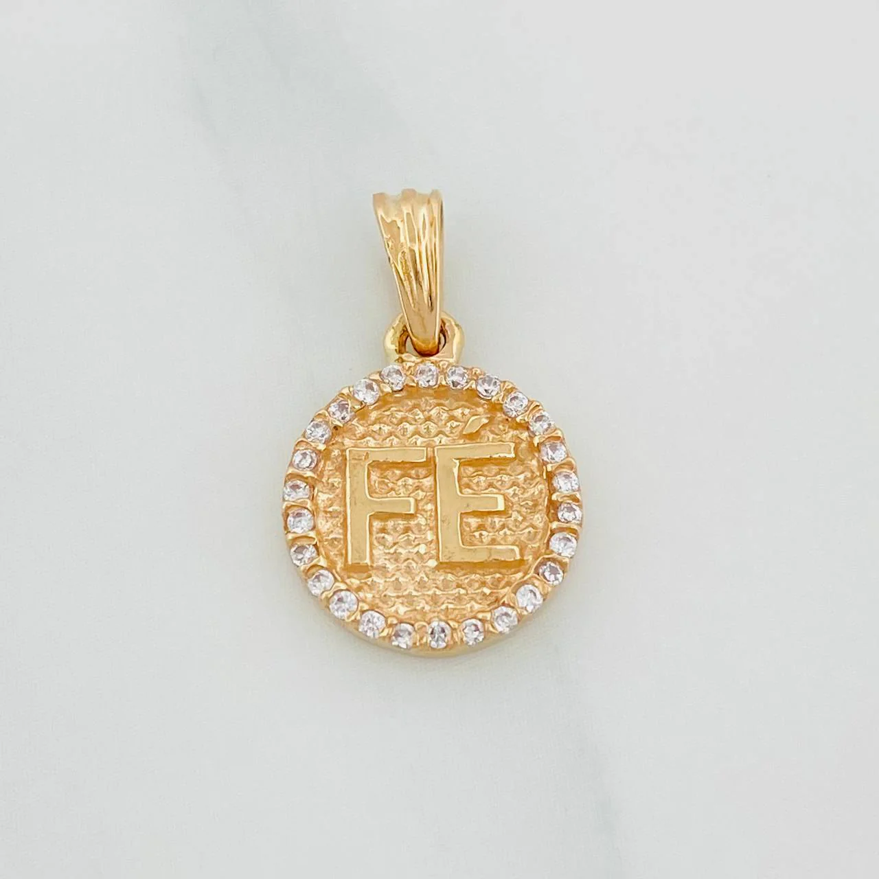 Dije Fe 1.45 g / 2 cm Oro Amarillo 18K