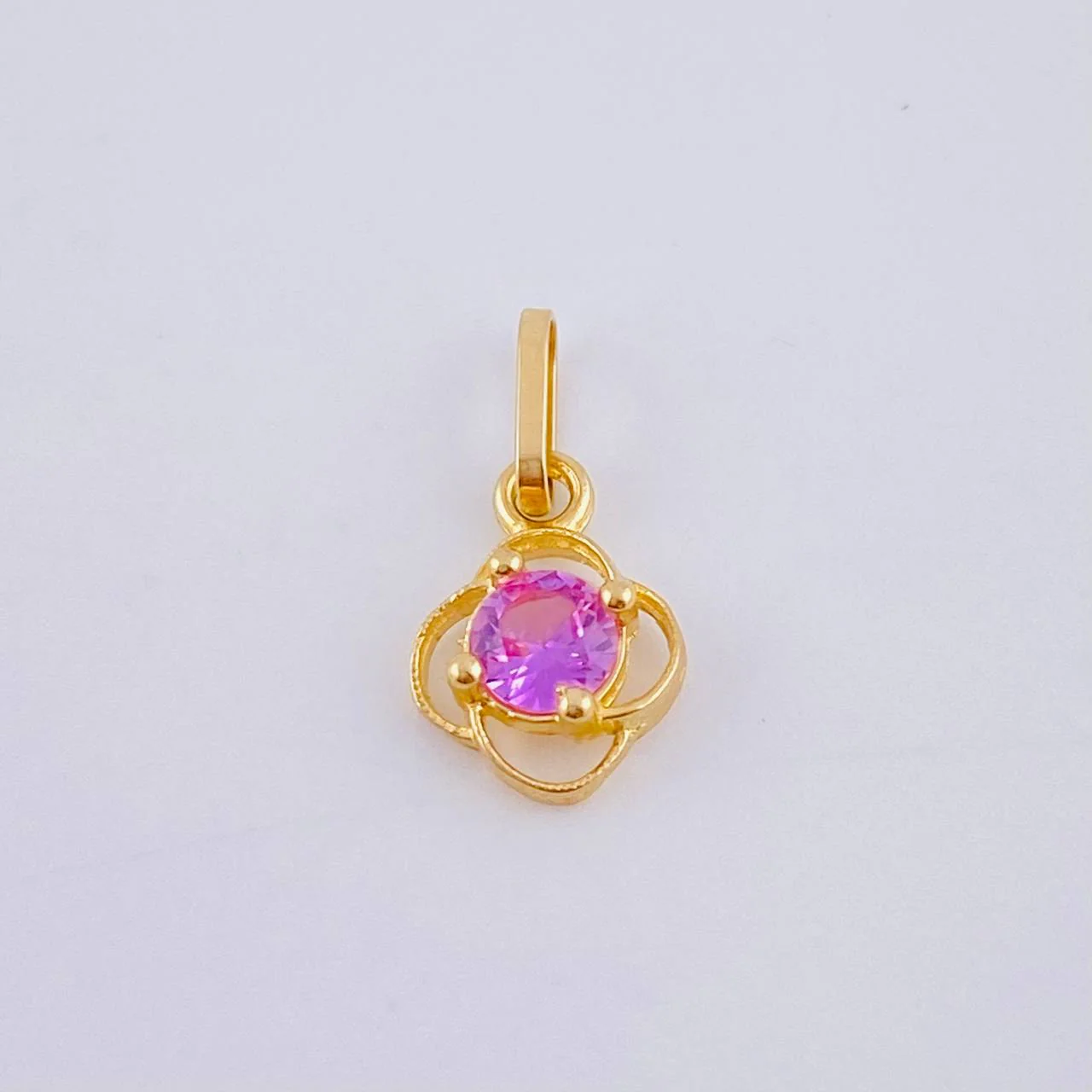 Dije Flor 0.35gr / 1.4cm / Oro Amarillo 18K ©