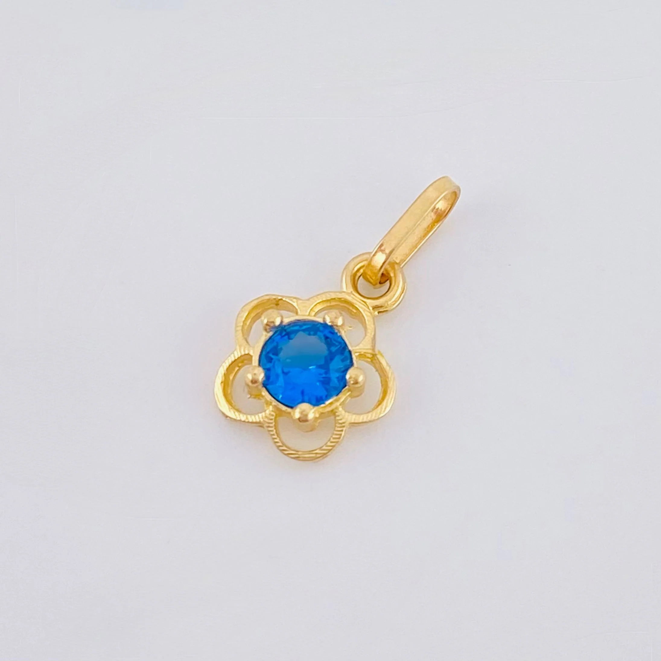Dije Flor 0.4gr / 1.3cm / Oro Amarillo 18K - Image 2