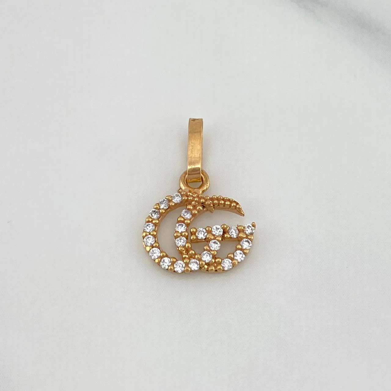 Dije Gg 0.55 g / 1.4 cm Oro Rosa 18K