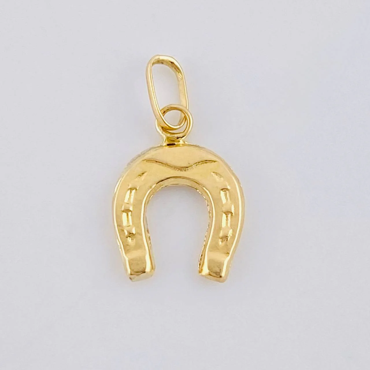 Dije Herradura 0.3 g / 1.5 cm Oro Amarillo 18K