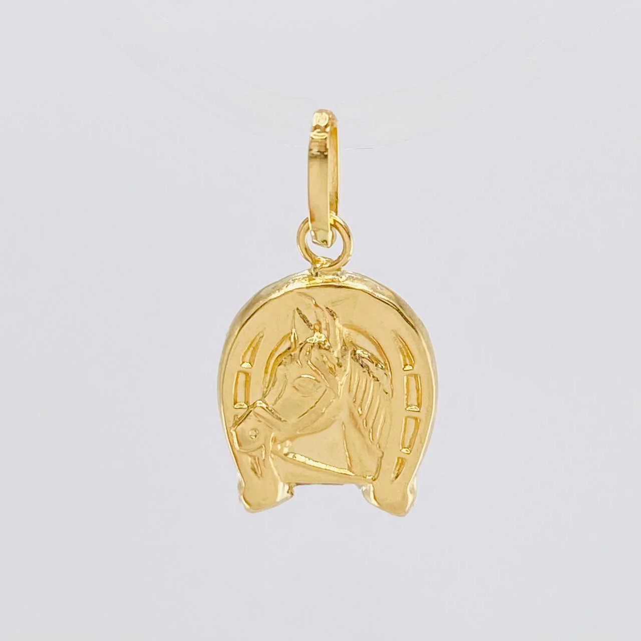 Dije Herradura Caballo 0.65 g / 1.7 cm Oro Amarillo 18K