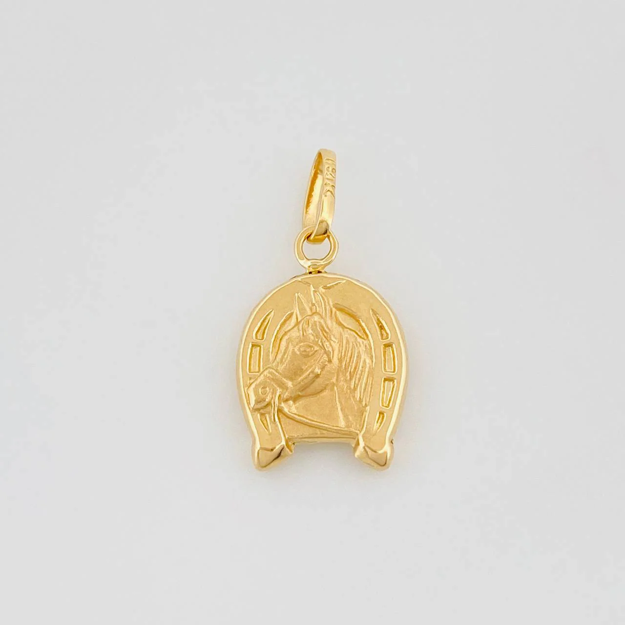 Dije Herradura Caballo 0.65 g / 1.9 cm Oro Amarillo 18K