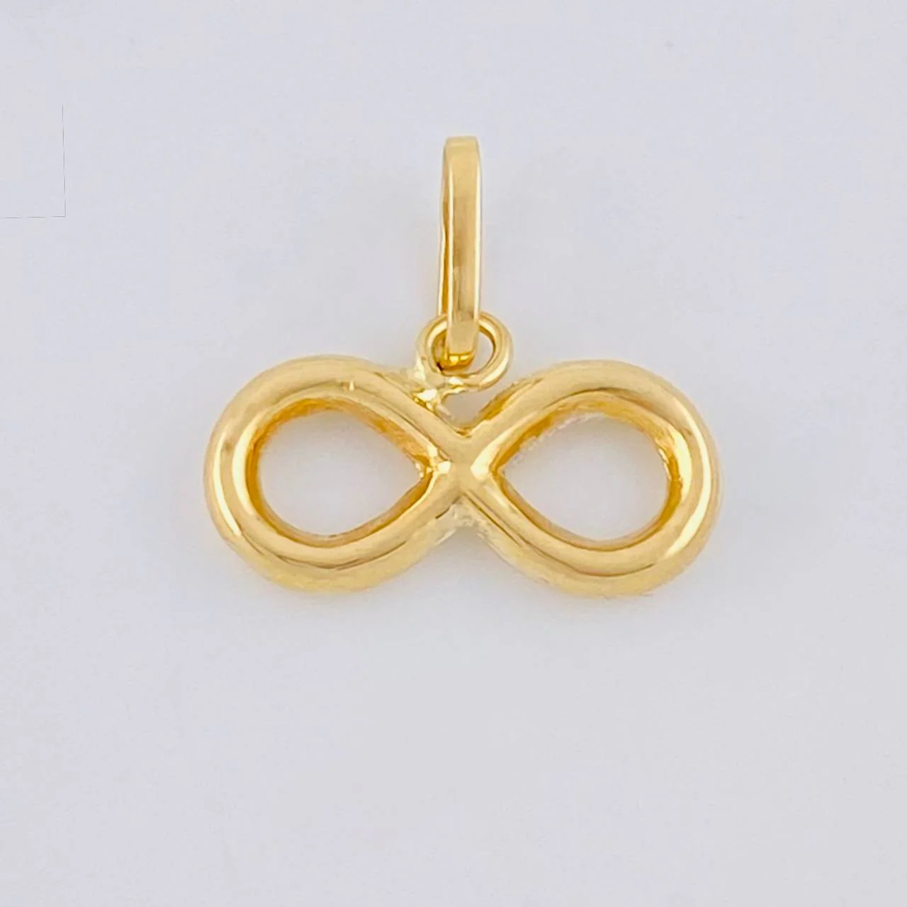 Dije Infinito 0.5 g / 1.2 cm Oro Amarillo 18K