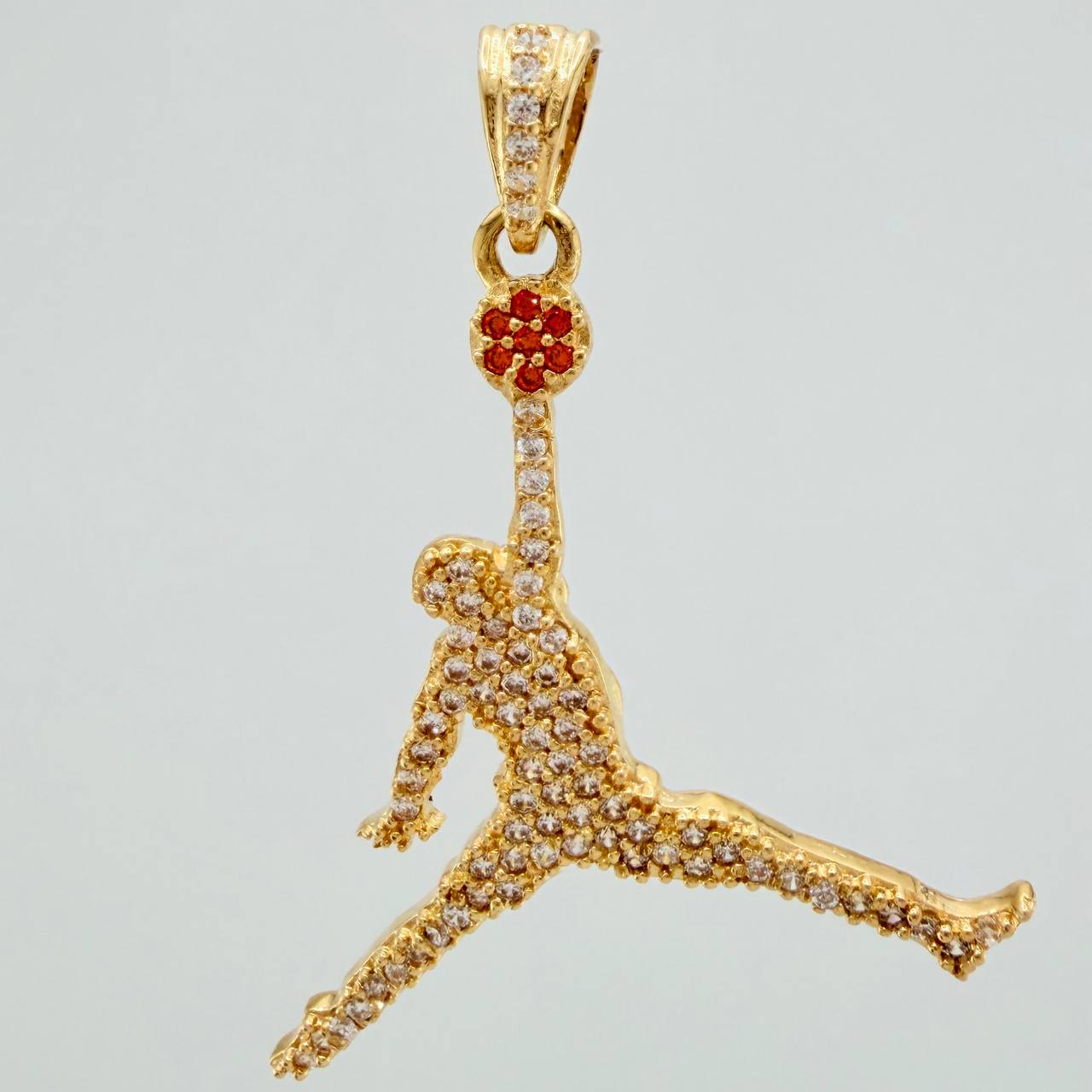 Dije Jugador 2.7gr / 3.7cm / Oro Amarillo 18K $