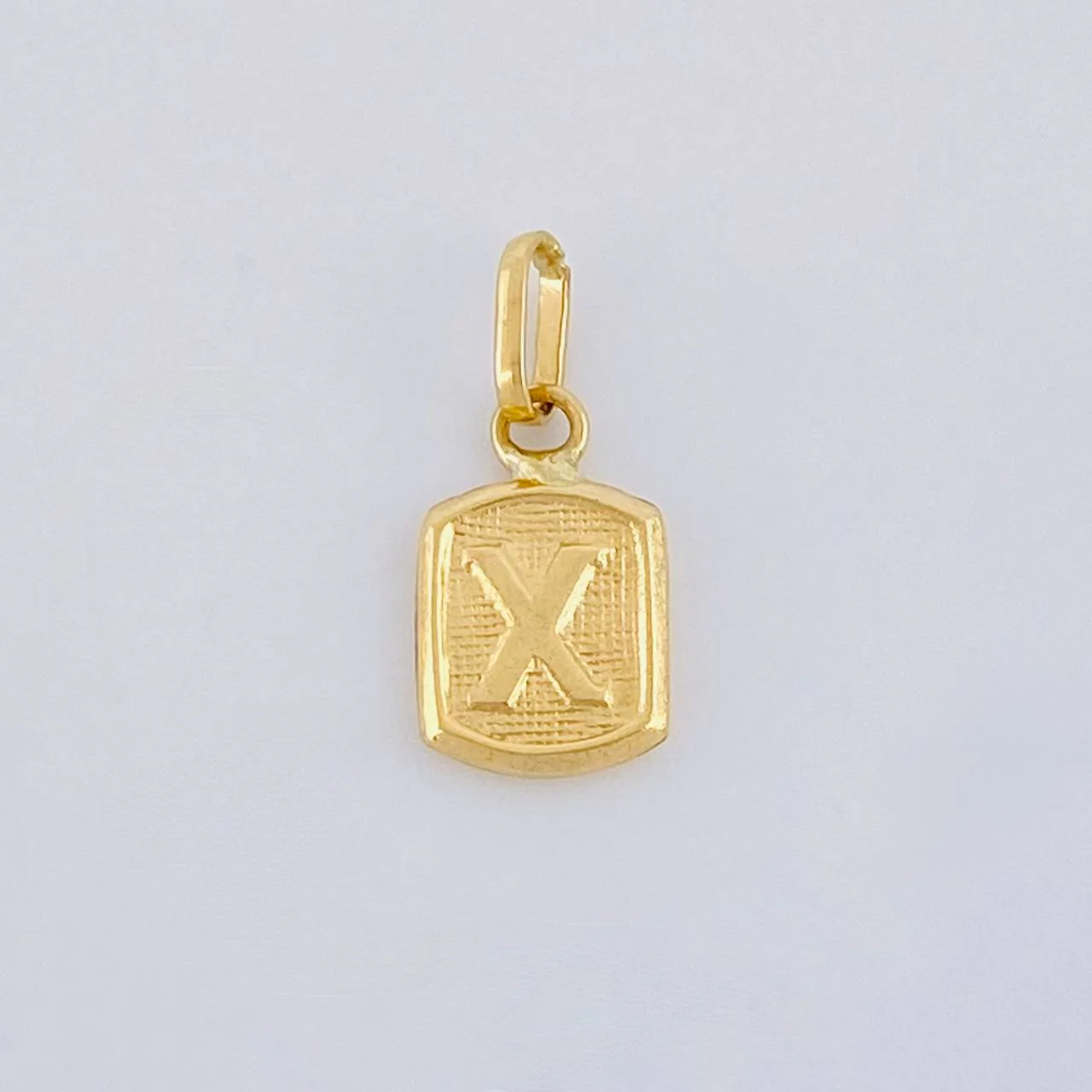 Dije Letra X 0.3 g / 1.4 cm Oro Amarillo 18K