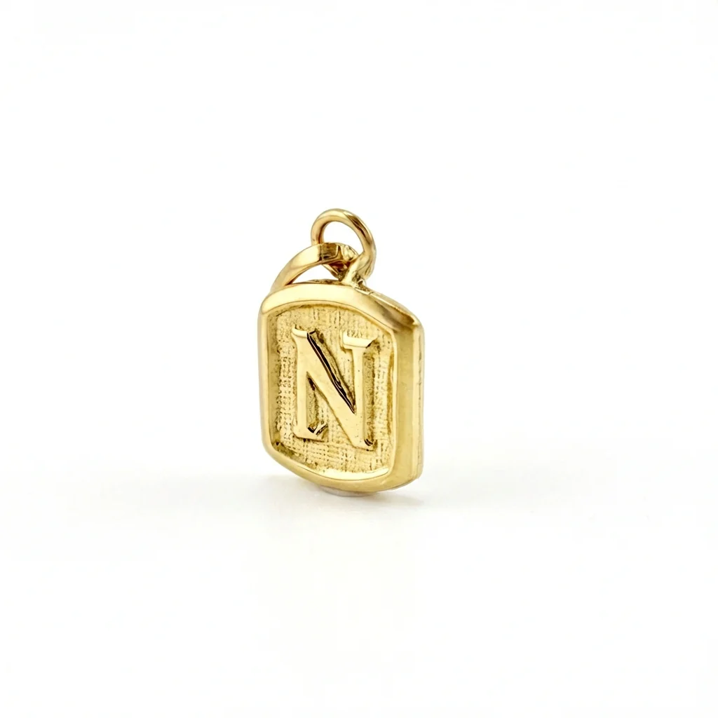 Dije Marco Letra N 0.3 g / 1.5 cm Oro Amarillo 18K