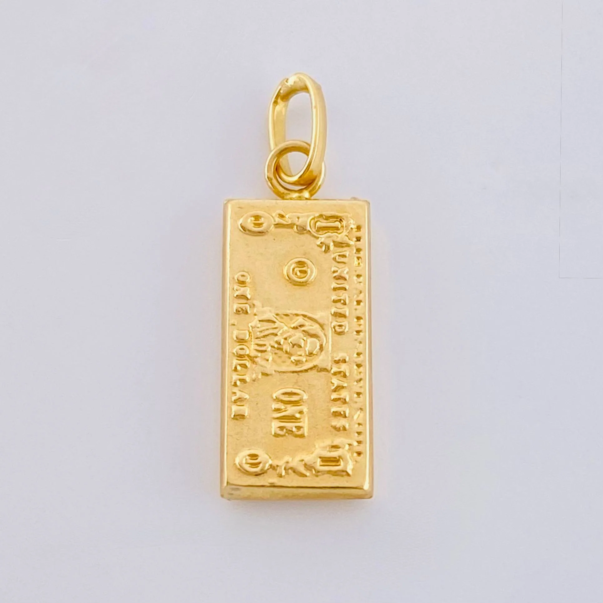 Dije One Dolar 0.65 g / 2.1 cm Oro Amarillo 18K