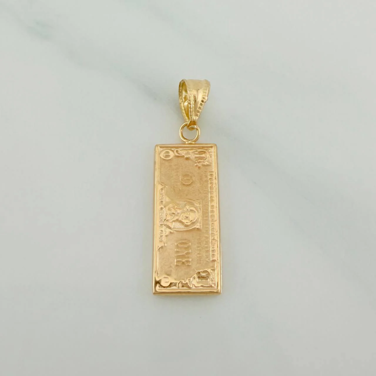 Dije One Dólar 0.95gr / 2.7cm / Oro Amarillo 18K %