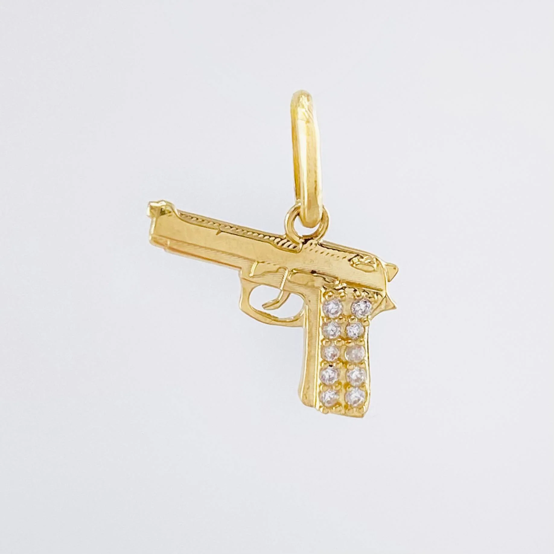 Dije Pistola 1.15gr / 1.5cm / Oro Amarillo 18K © - Image 2