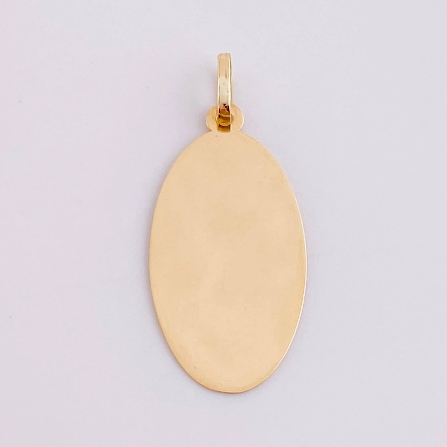 Dije Placa Ovalada 0.85g / 2.9cm Oro Amarillo 18K