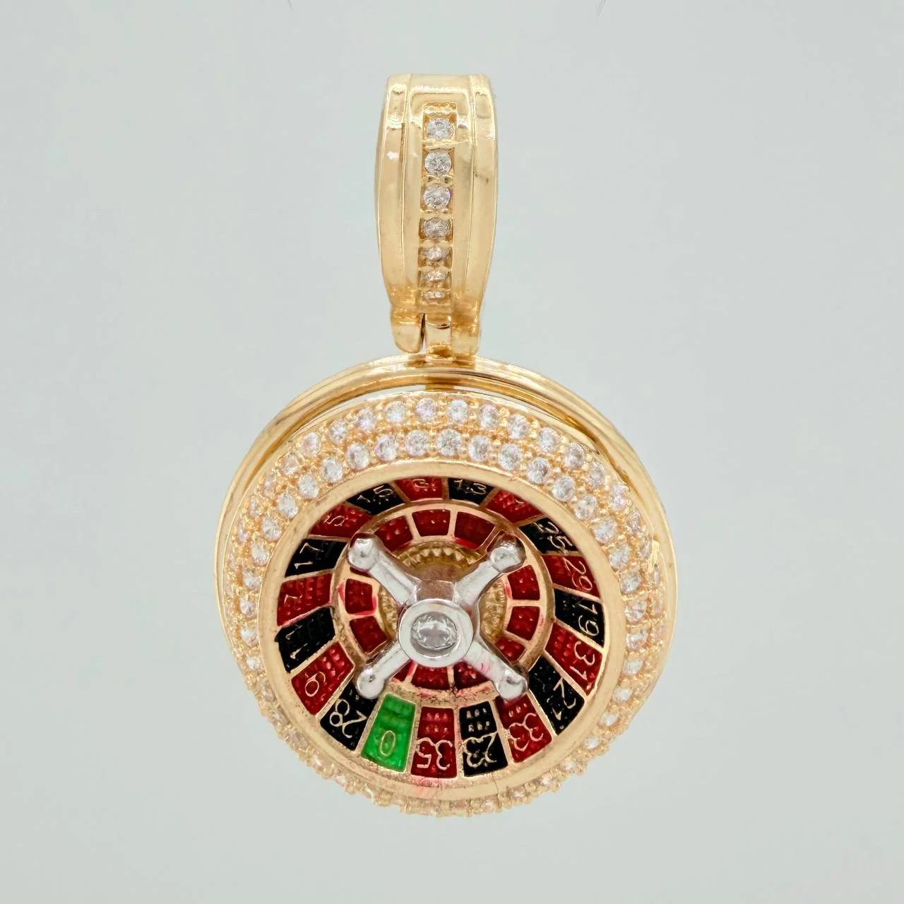 Dije Ruleta 6.6gr / 3cm / Dos Oros Amarillo Blanco 18K %