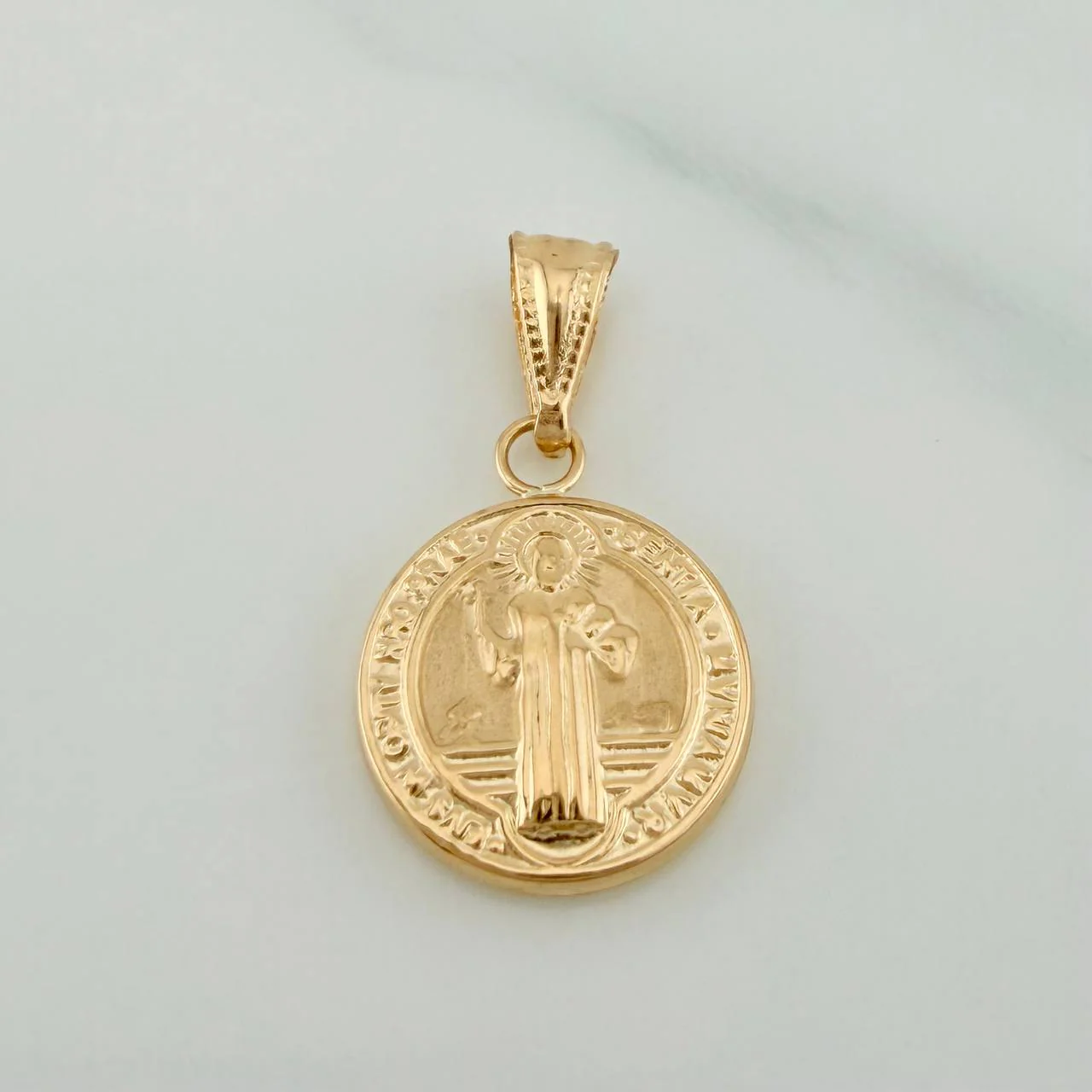 Dije San Benito 0.85gr / 2cm / Oro Amarillo 18K %