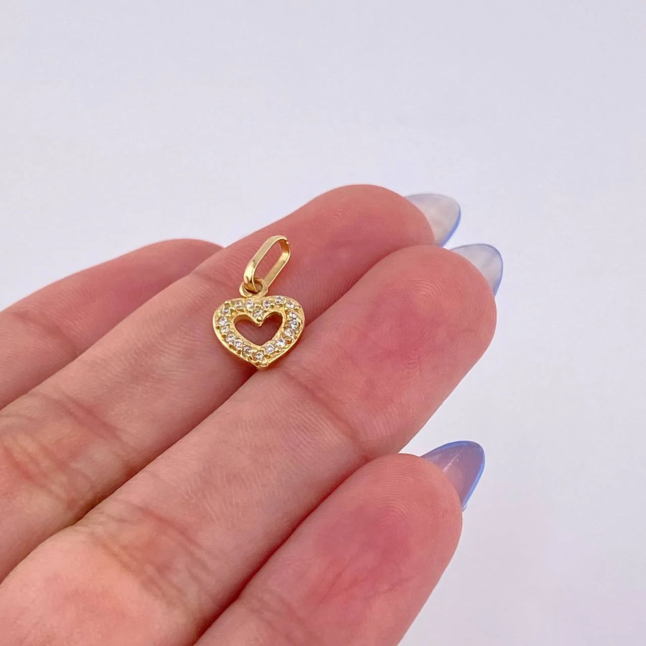 Dije Silueta Corazón Tupido 0.7gr / 1.7cm / Oro Amarillo 18K - Image 4