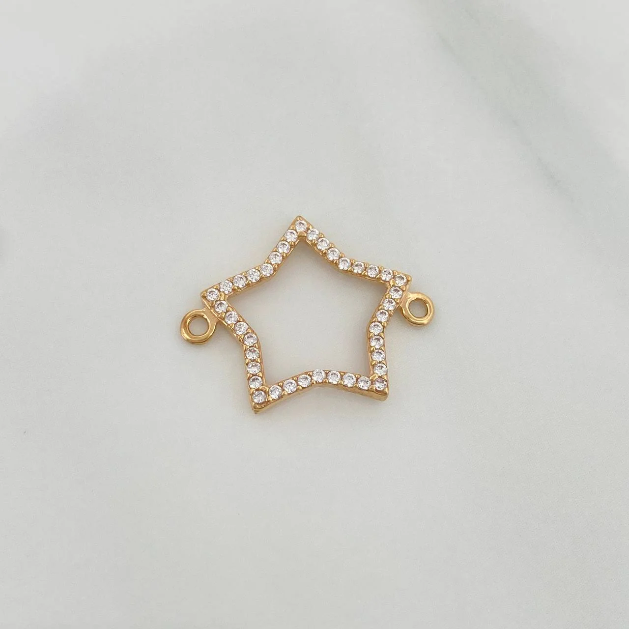 Herraje Silueta Estrella 0.9gr / 1.9cm / Oro Amarillo 18K %
