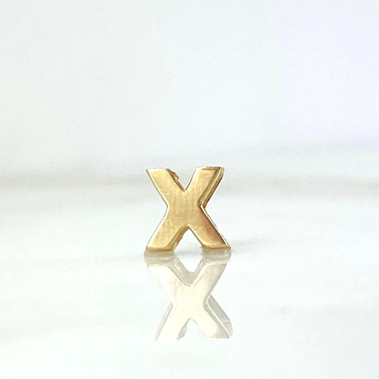 Herraje Tambor Letra X 0.35gr / 6mm Oro Amarillo 18K