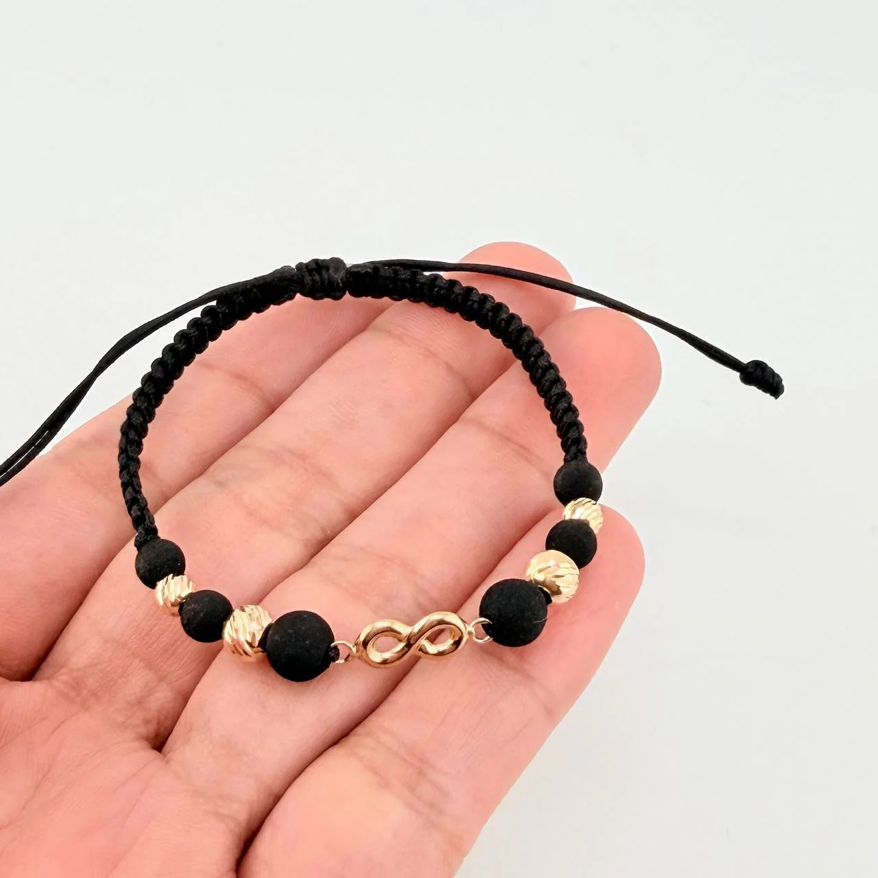 Pulsera Tejida Negra Herraje Infinito Bolas Diamantadas 4Mm-5Mm / 4 Und Oro Amarillo 18K - Image 3