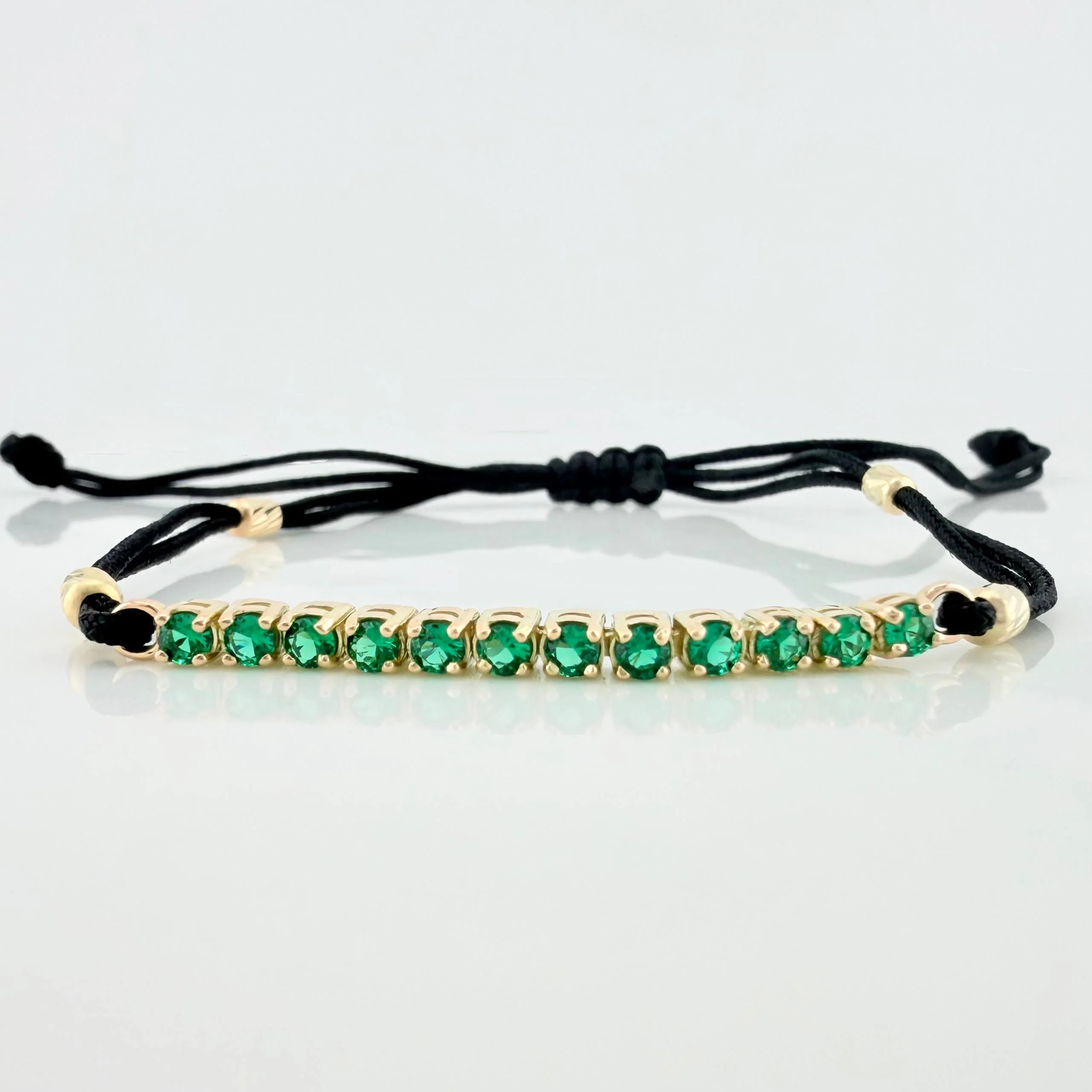 Pulsera Tejida Negra Tennis Oro Amarillo 18K