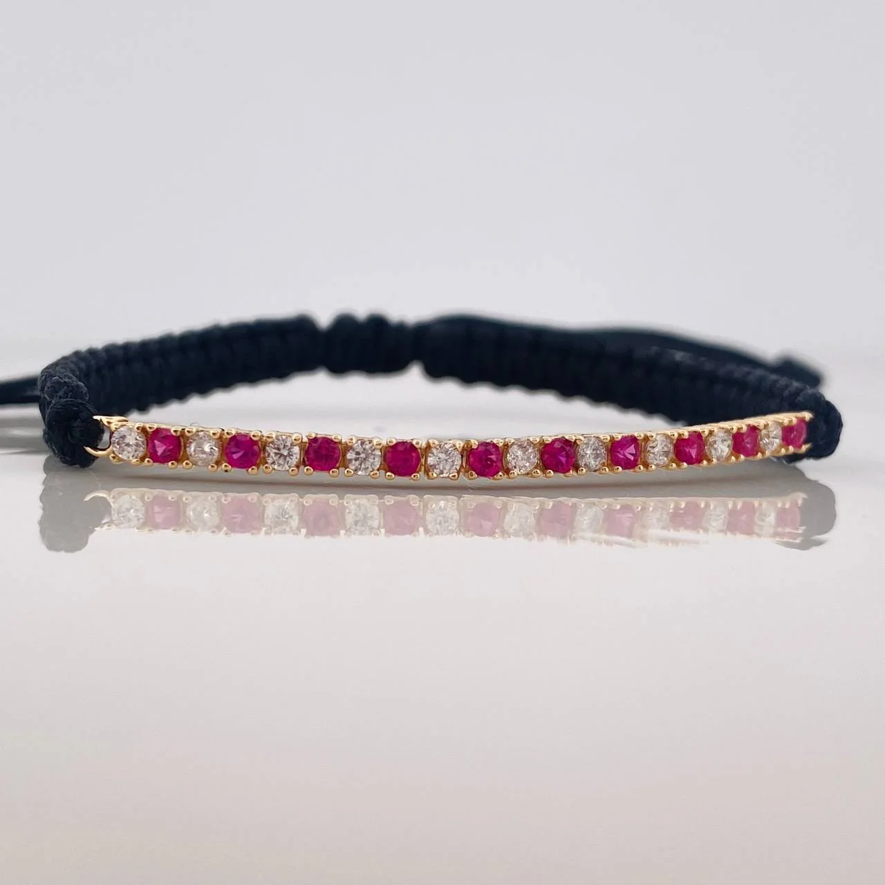Pulsera Tejida Negra Tennis Oro Amarillo 18K