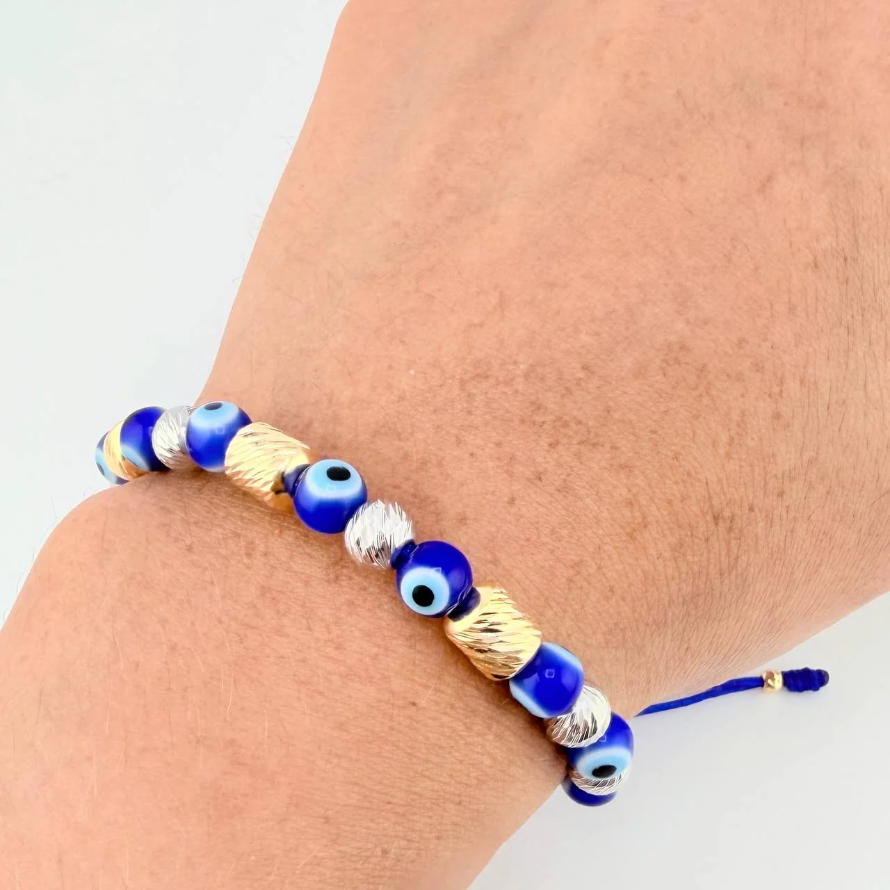 Pulsera Tejida Ojos Turcos Cilindros 6Mm-3Mm Dos Oros Amarillo Blanco 18K - Image 2