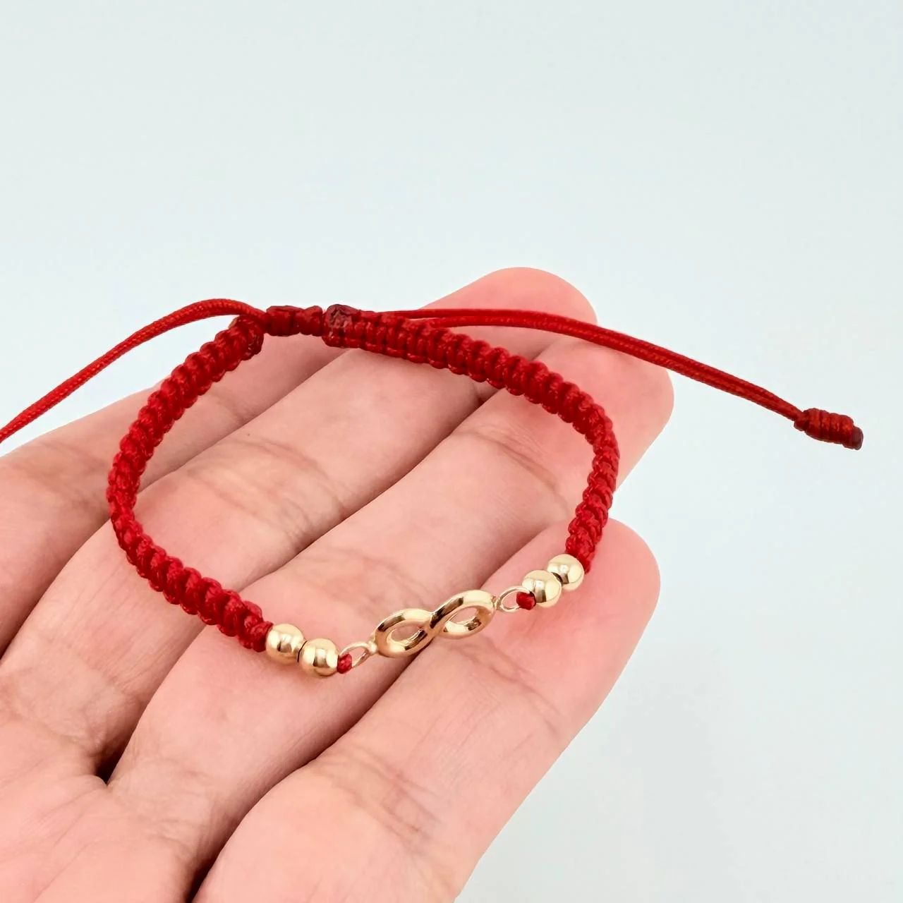 Pulsera Tejida Roja Herraje Infinito Bolas Lisas 3Mm / 4 Und Oro Amarillo 18K - Image 3