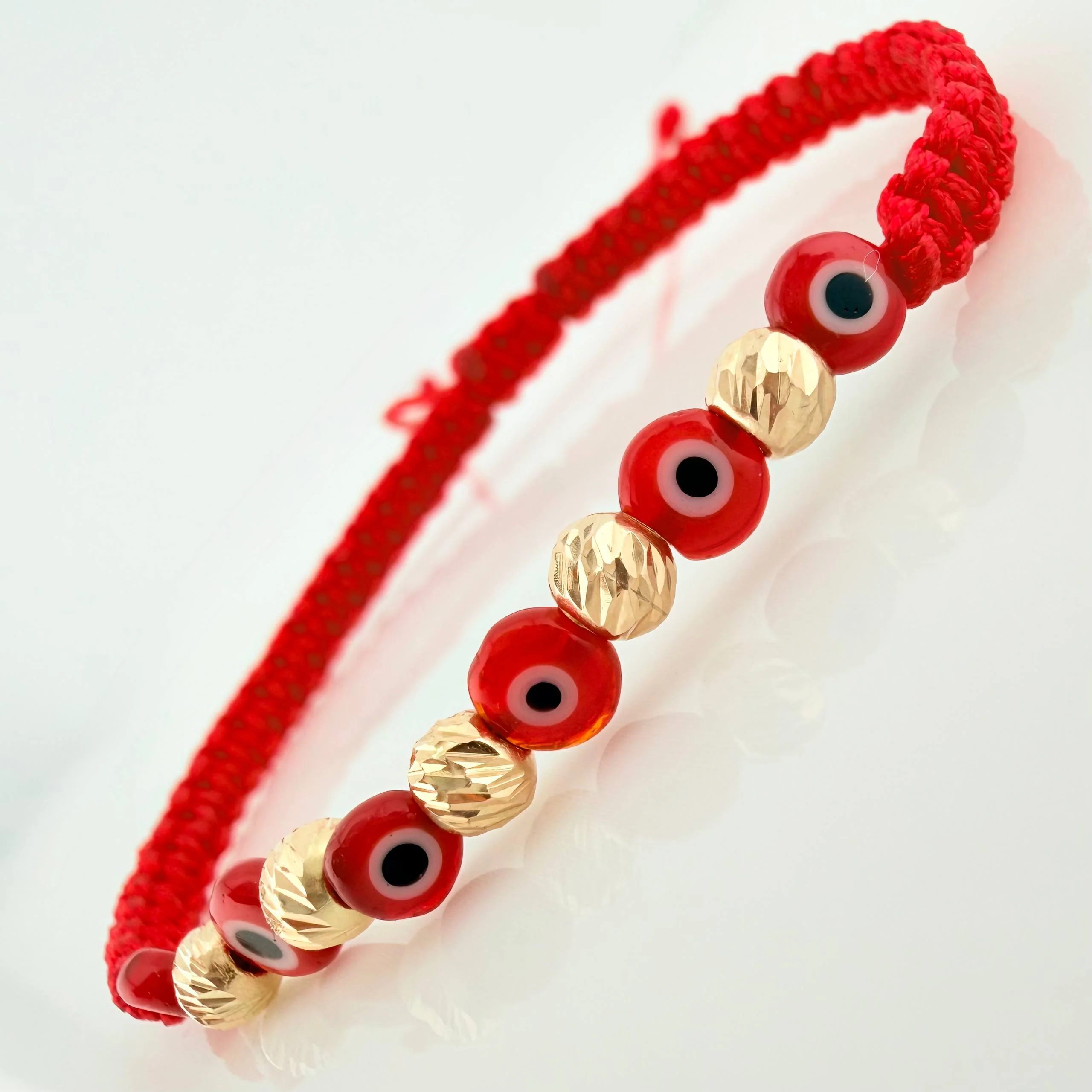 Pulsera Tejida Roja Ojos Turcos Oro Amarillo 18K - Image 2