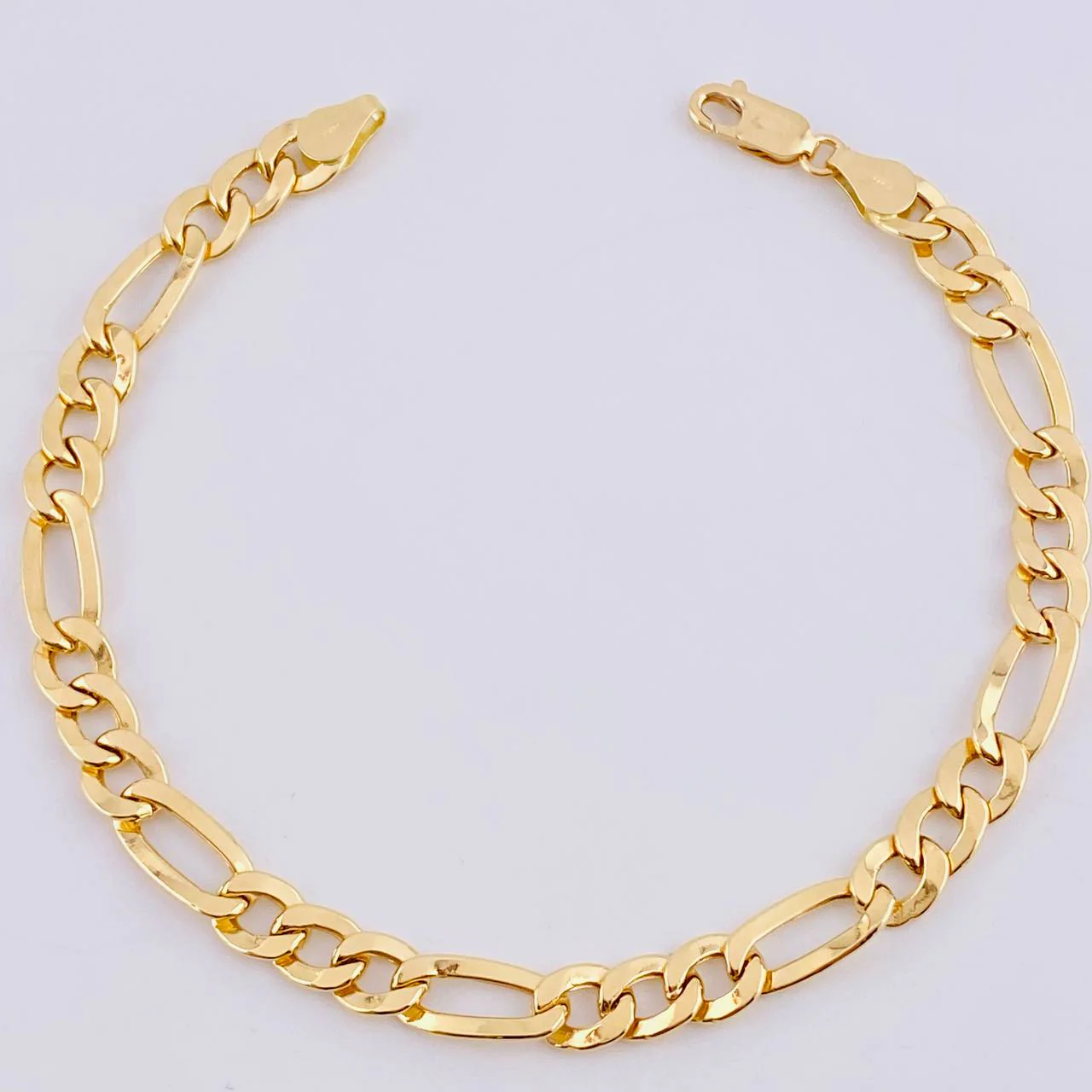 Pulso Figaro 6.1gr / 22cm / 6.4mm Oro Amarillo +1 18K *