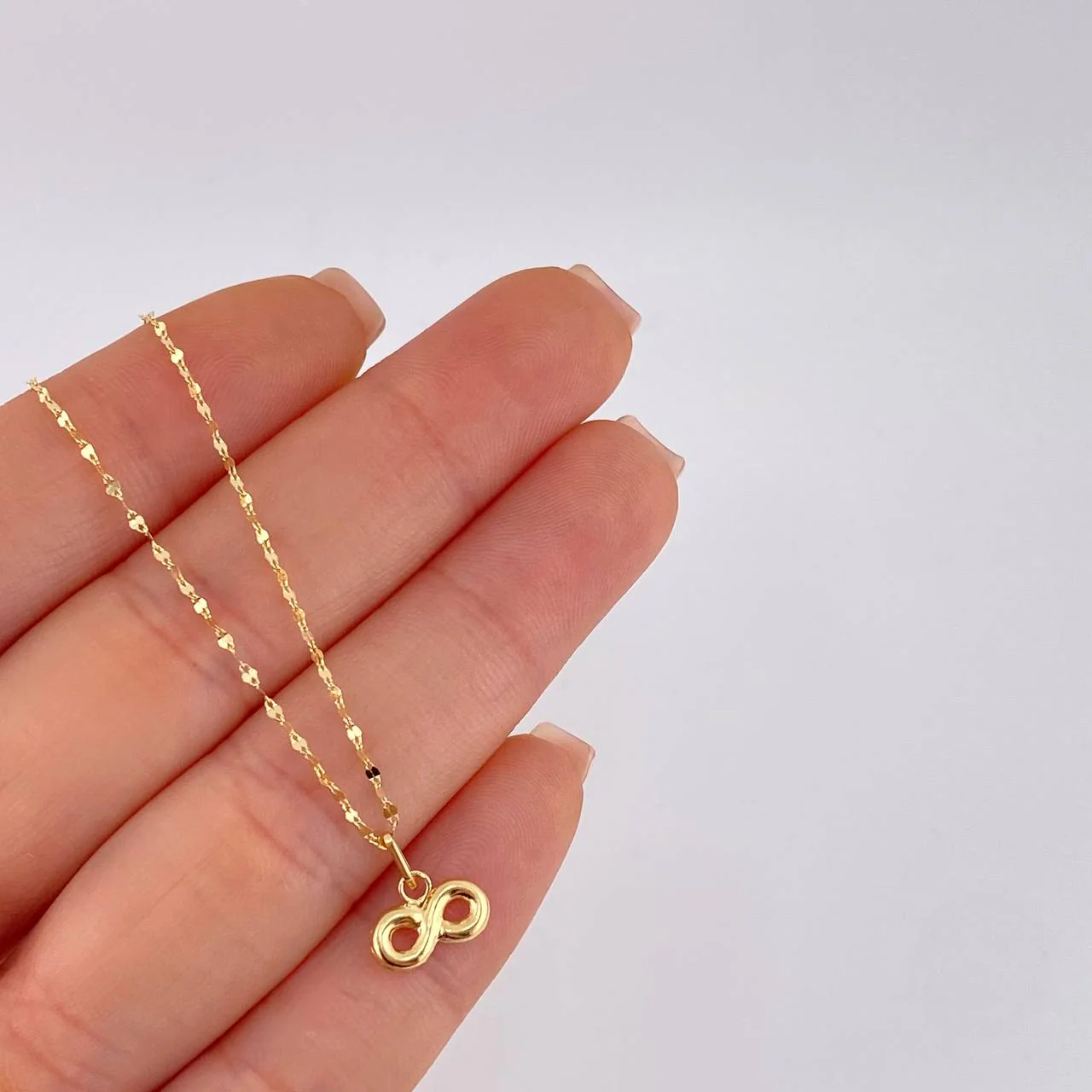 Set Cadena Flor Espejo + Dije Infinito / 1.1gr / 45.1 cm Oro Amarillo 18K - Image 5