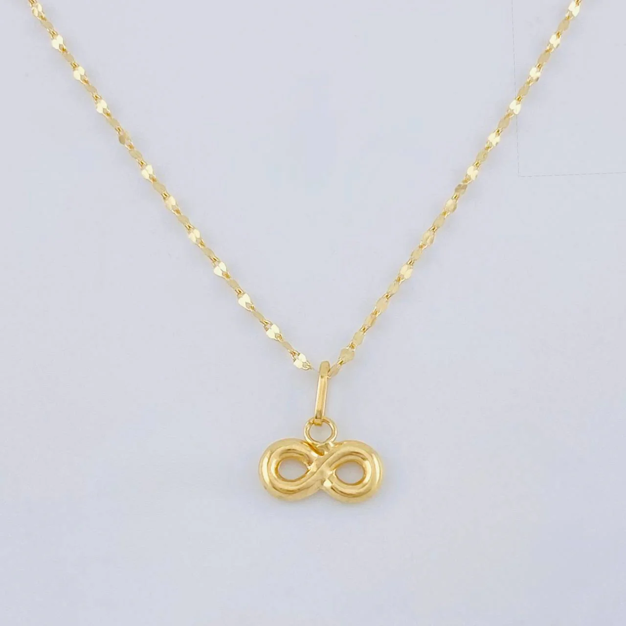 Set Cadena Flor Espejo + Dije Infinito / 1.1gr / 45.2 cm Oro Amarillo 18K