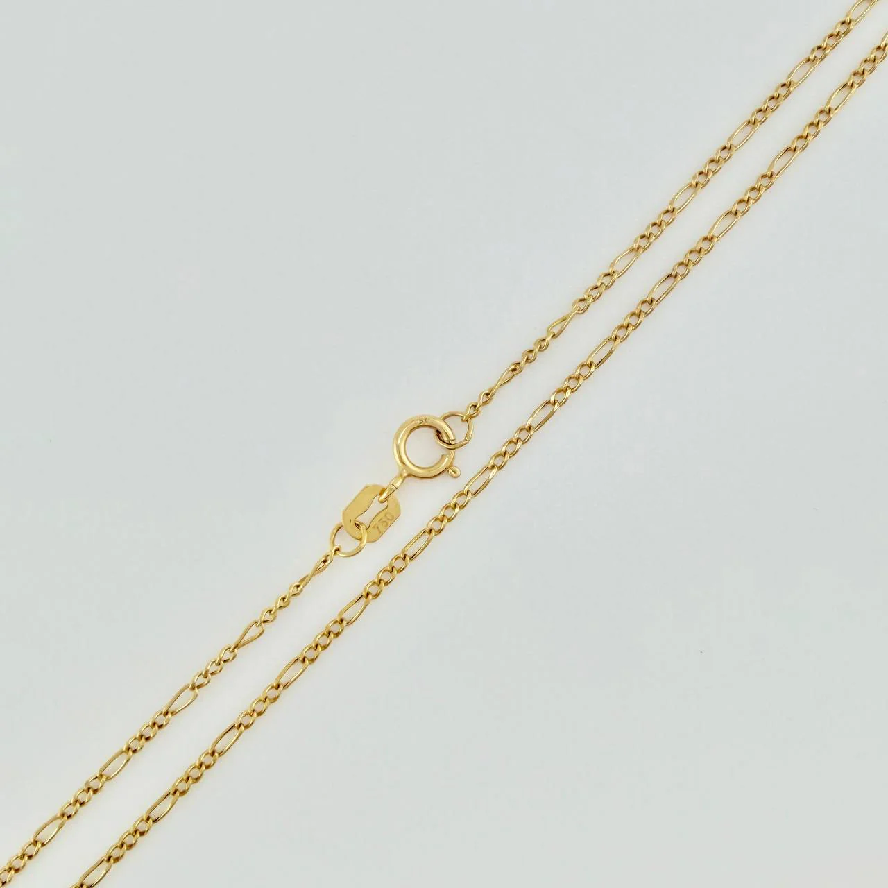 Set Cadena y Dije Figaro + Cruz 1.4gr / 50cm / 1.25mm Oro Amarillo 18K (Oferta) $ - Image 4