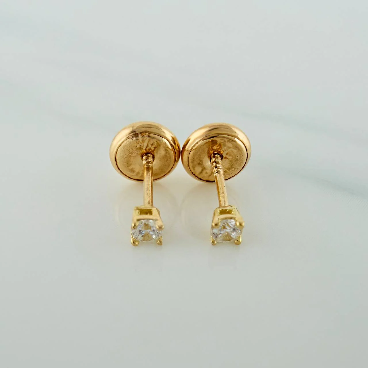 Topos Chispa 0.5gr / 1mm Oro Amarillo 18K &