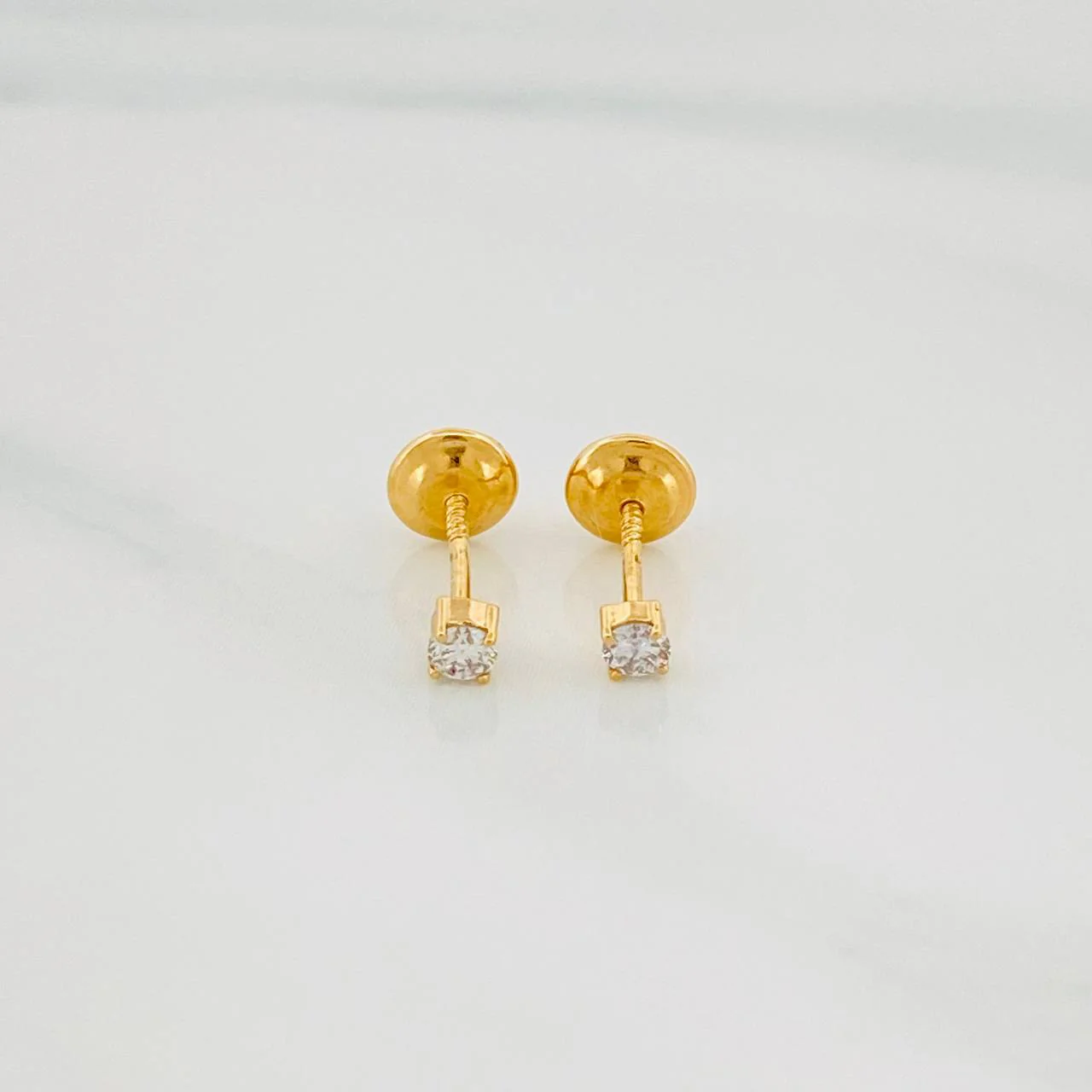 Topos Cuatro Garras Diamantes 10Pts 0.55 g / 2.33 mm Oro Amarillo 18K